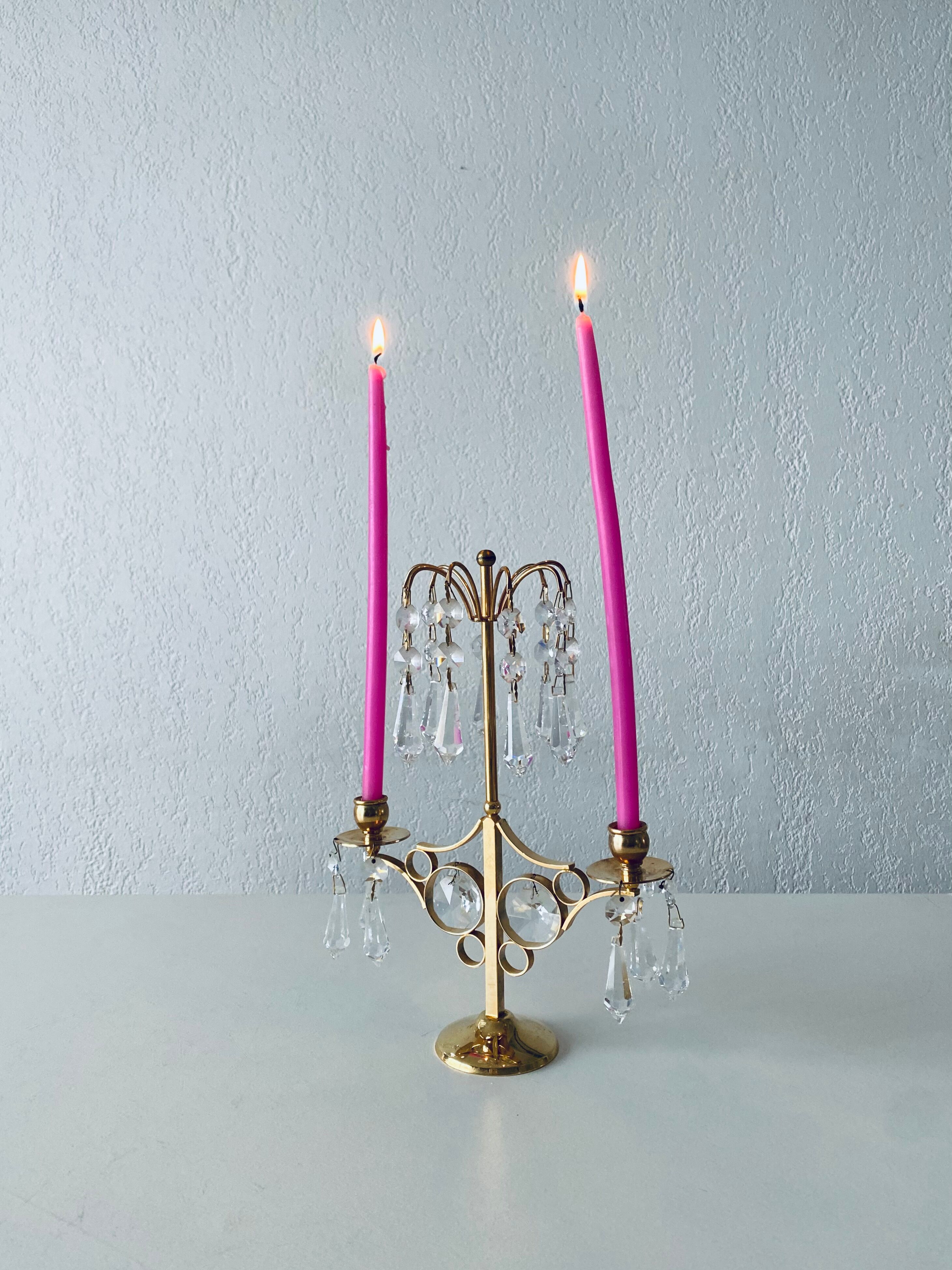 Candle holder with tassels