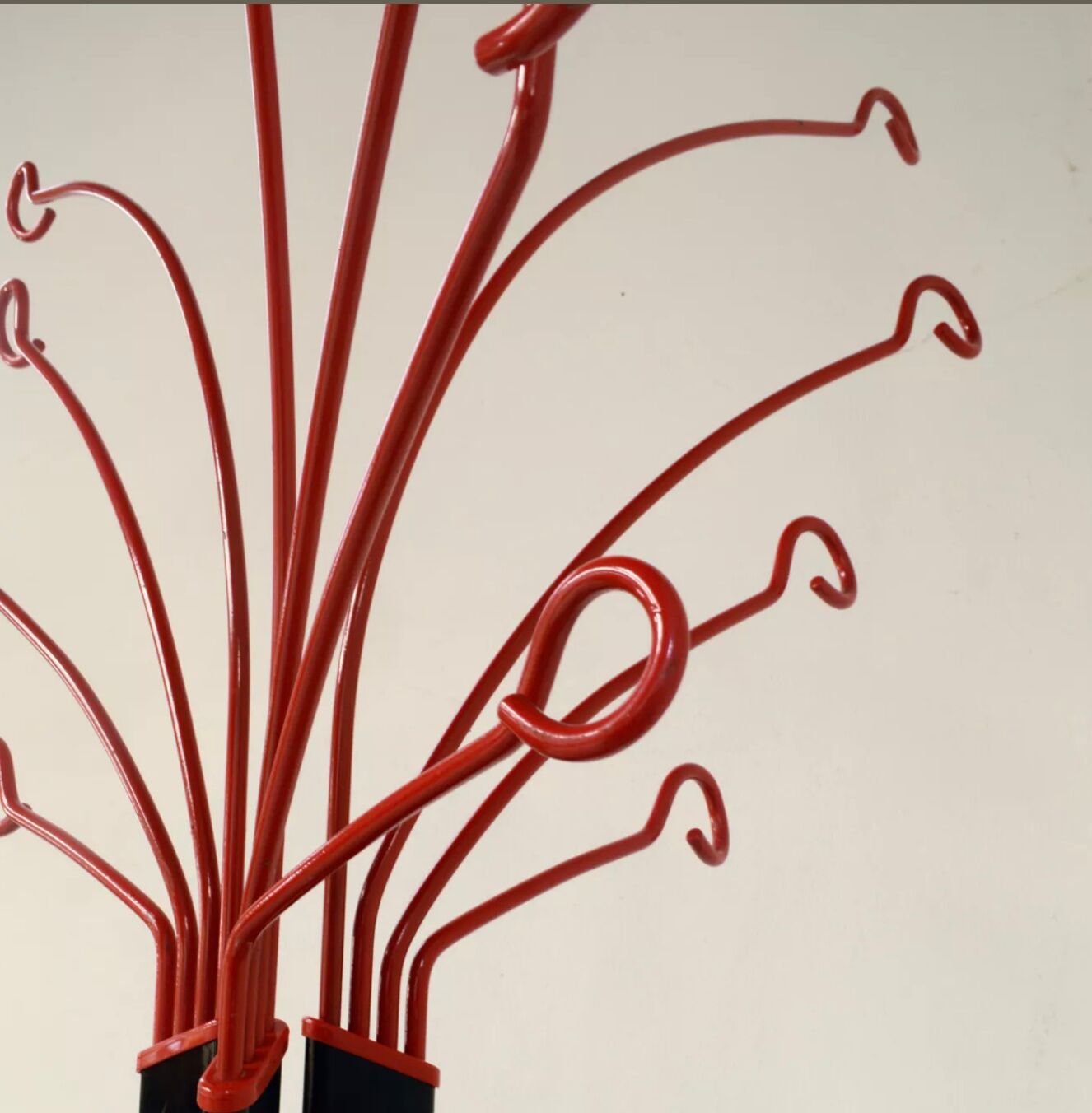 Coat rack on foot metal red and black 12 branches, 80s