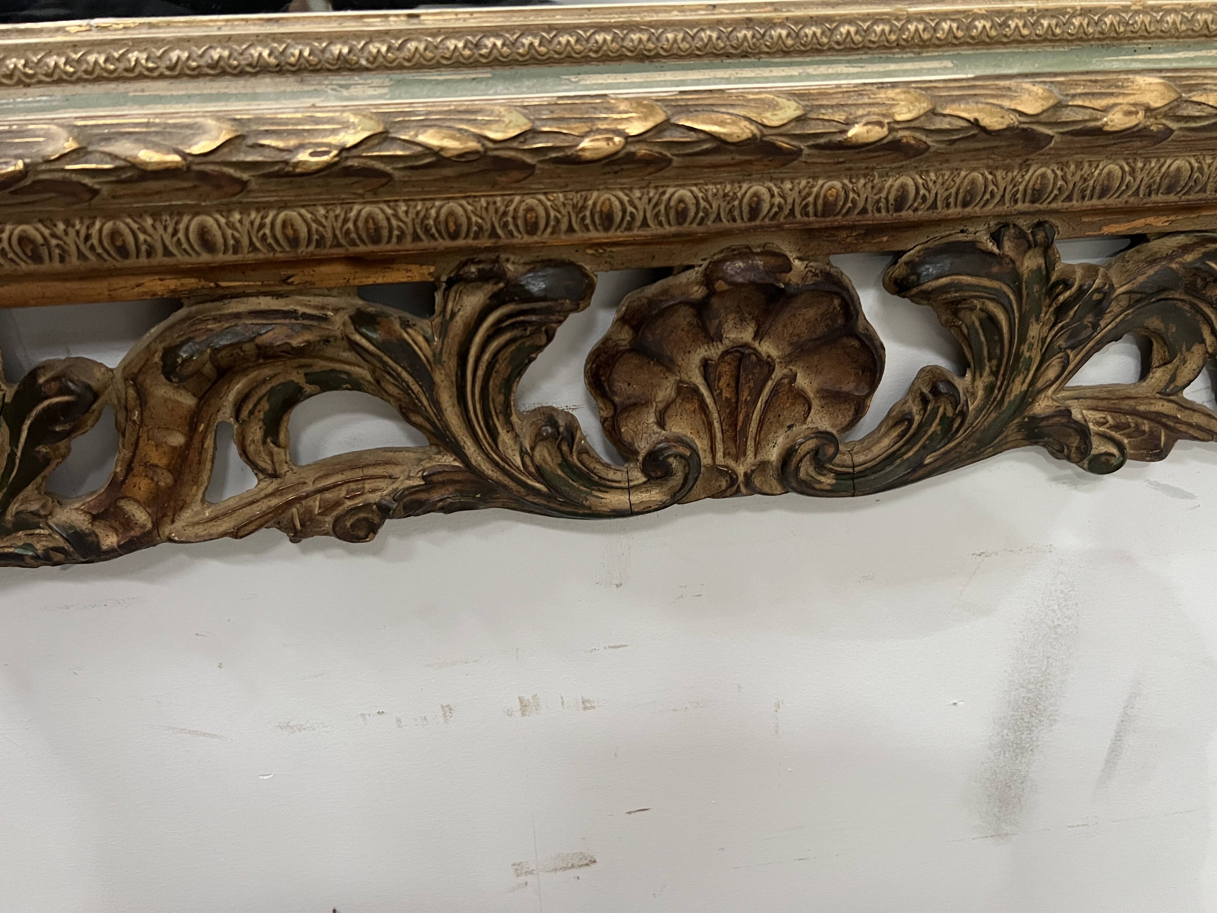 Napoleon III style mirror in carved wood, 20th century.