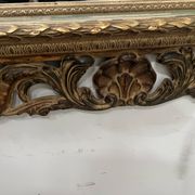 Napoleon III style mirror in carved wood, 20th century.