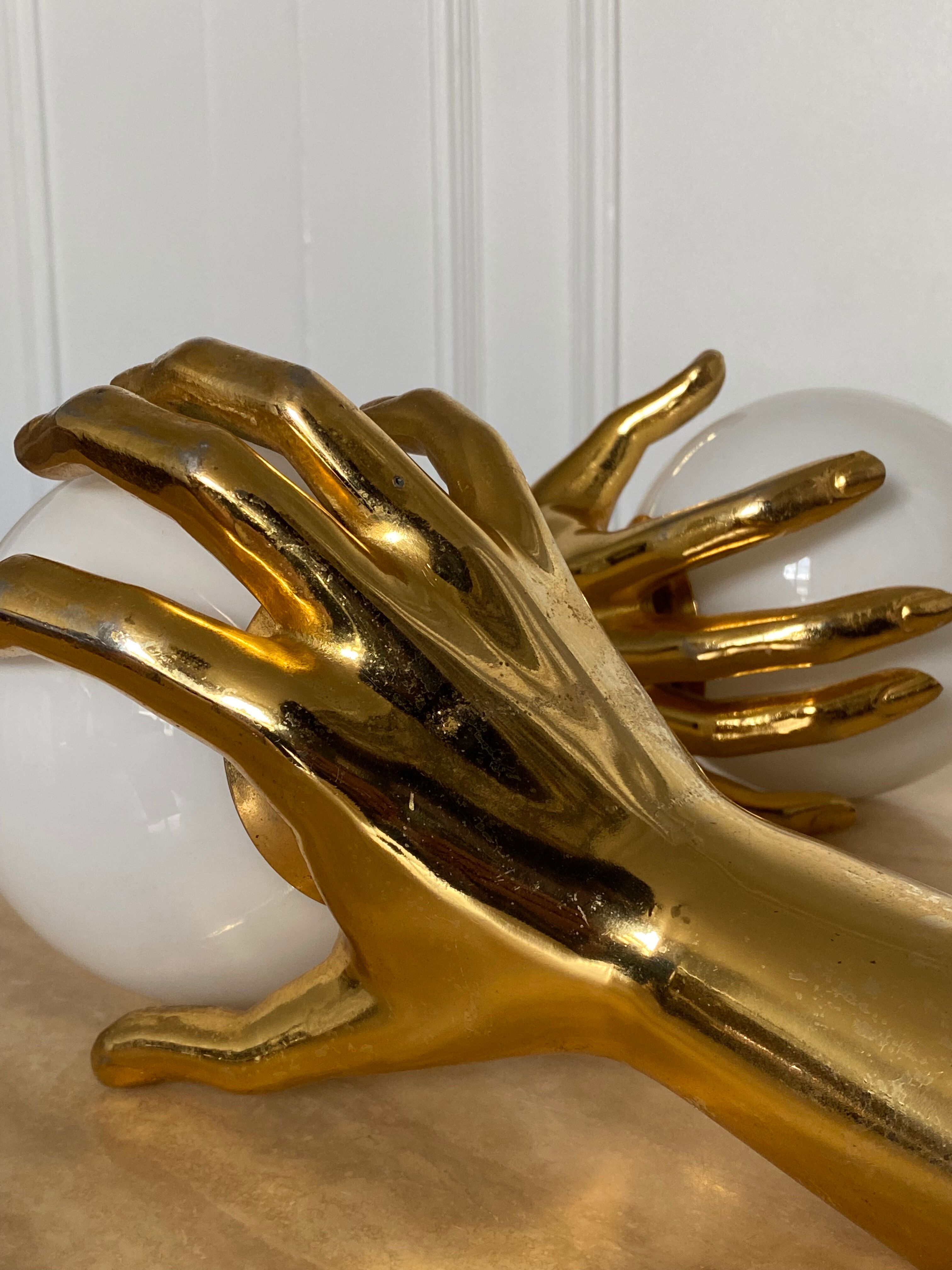 Pair of Arlus hand sconces