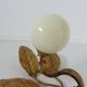 Wall lamp " flower " in golden metal and opaline ball 70s