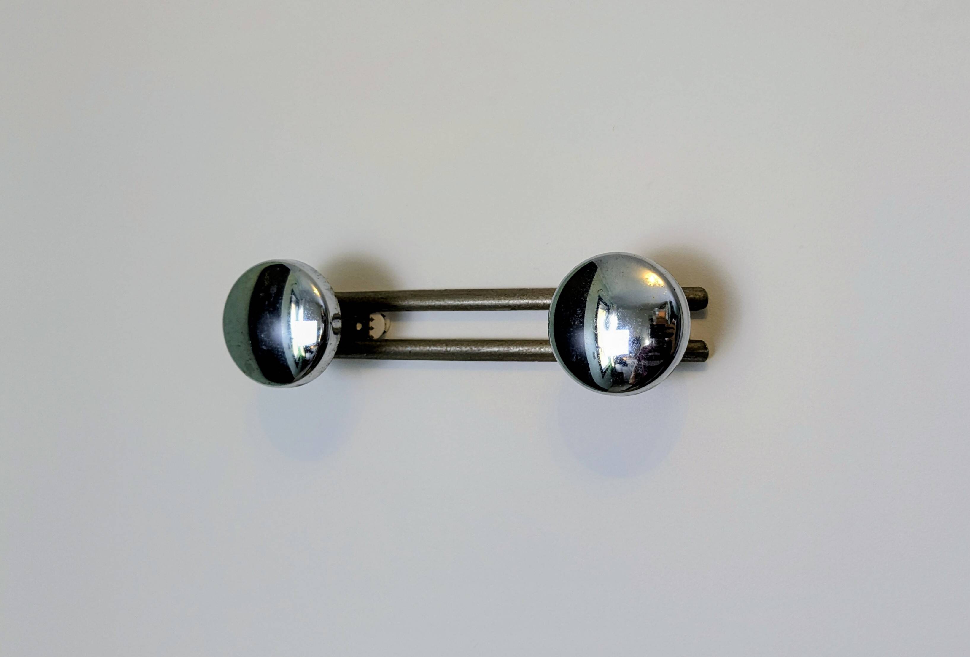 Double wall hook in chrome metal, vintage design.