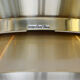 Brass colored aluminium pendant light by Carl Thore for Granhaga Metall. Sweden 1970s.
