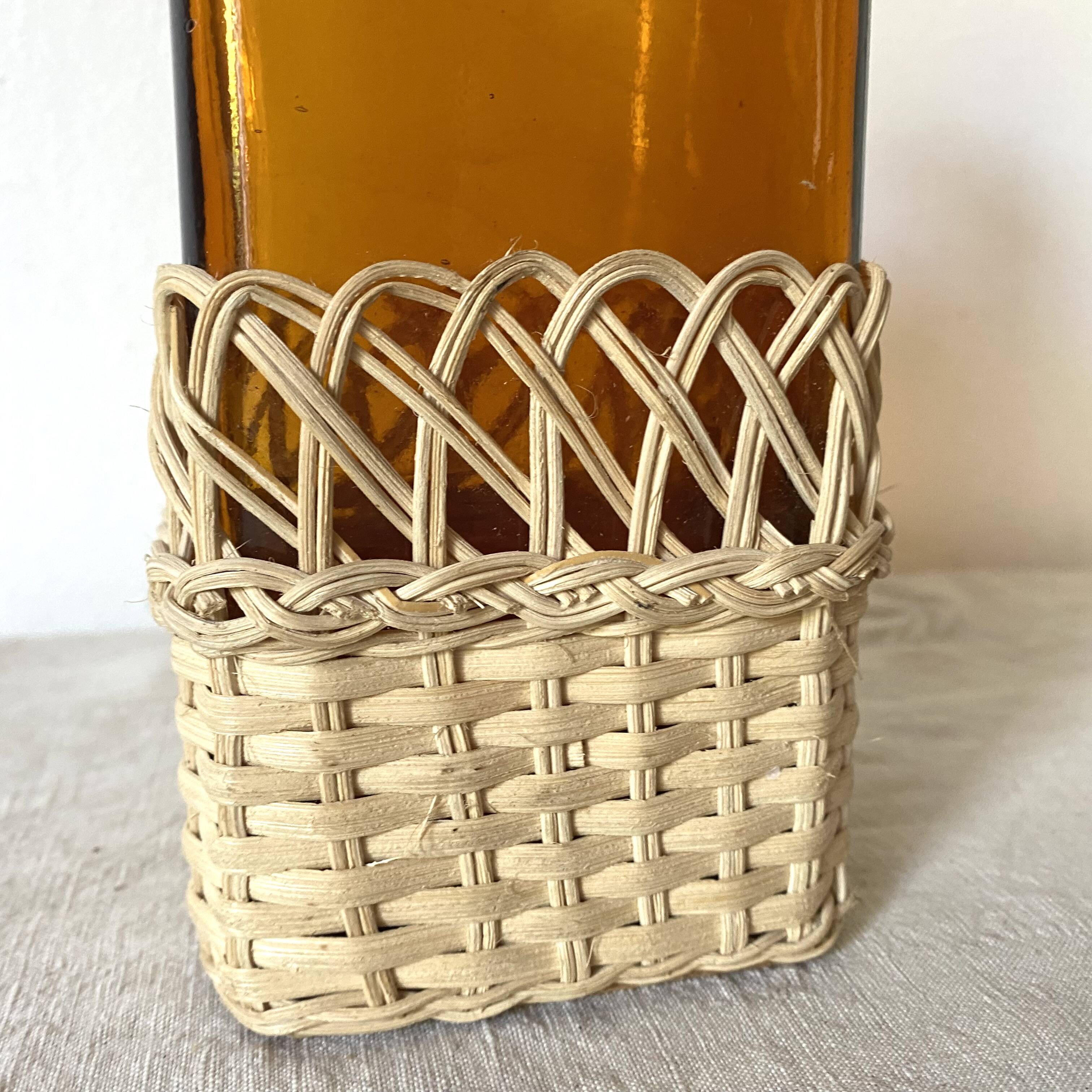 Amber glass and rattan carafe