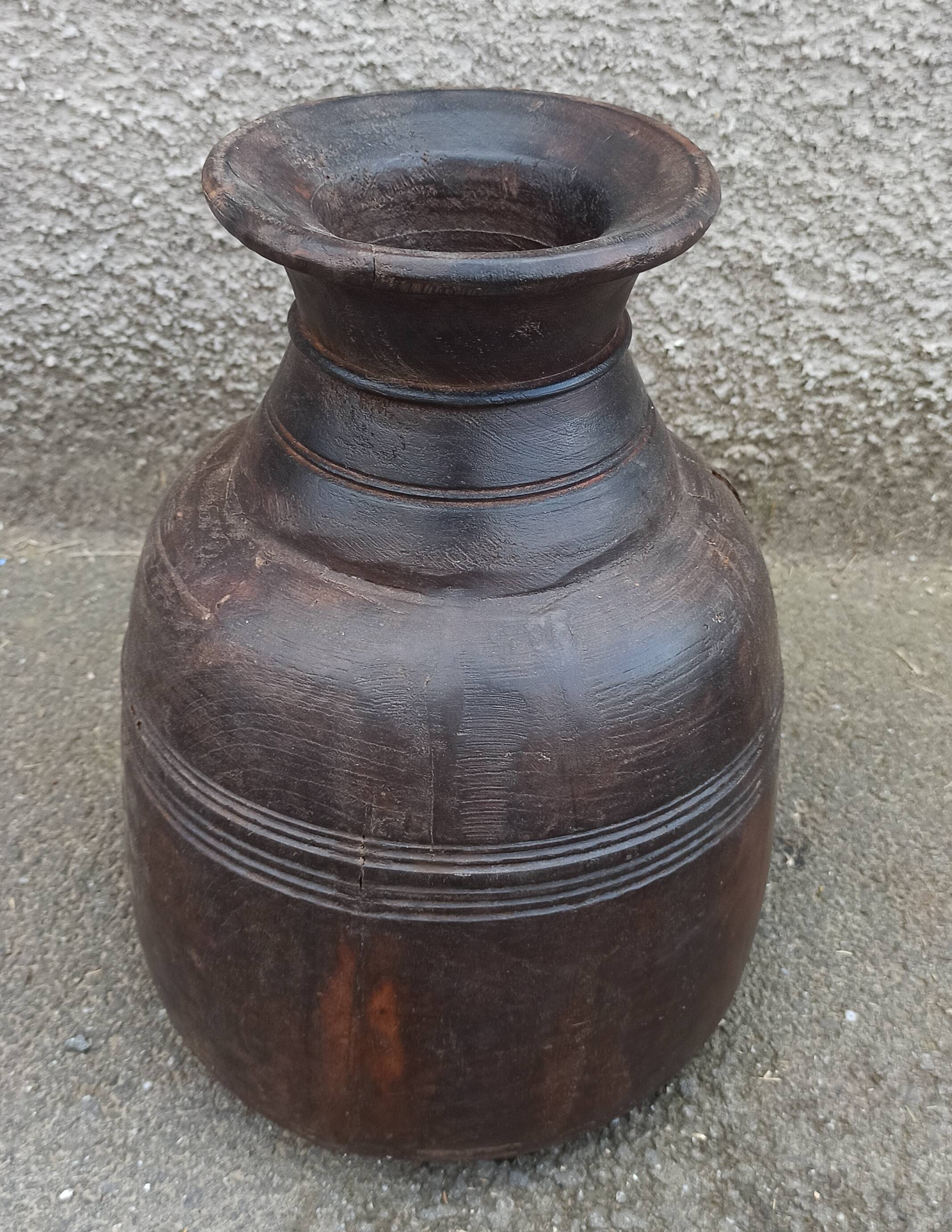Small old wooden pot