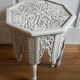 Oriental tea table or pedestal table forming a side table in solid carved and white lacquered wood