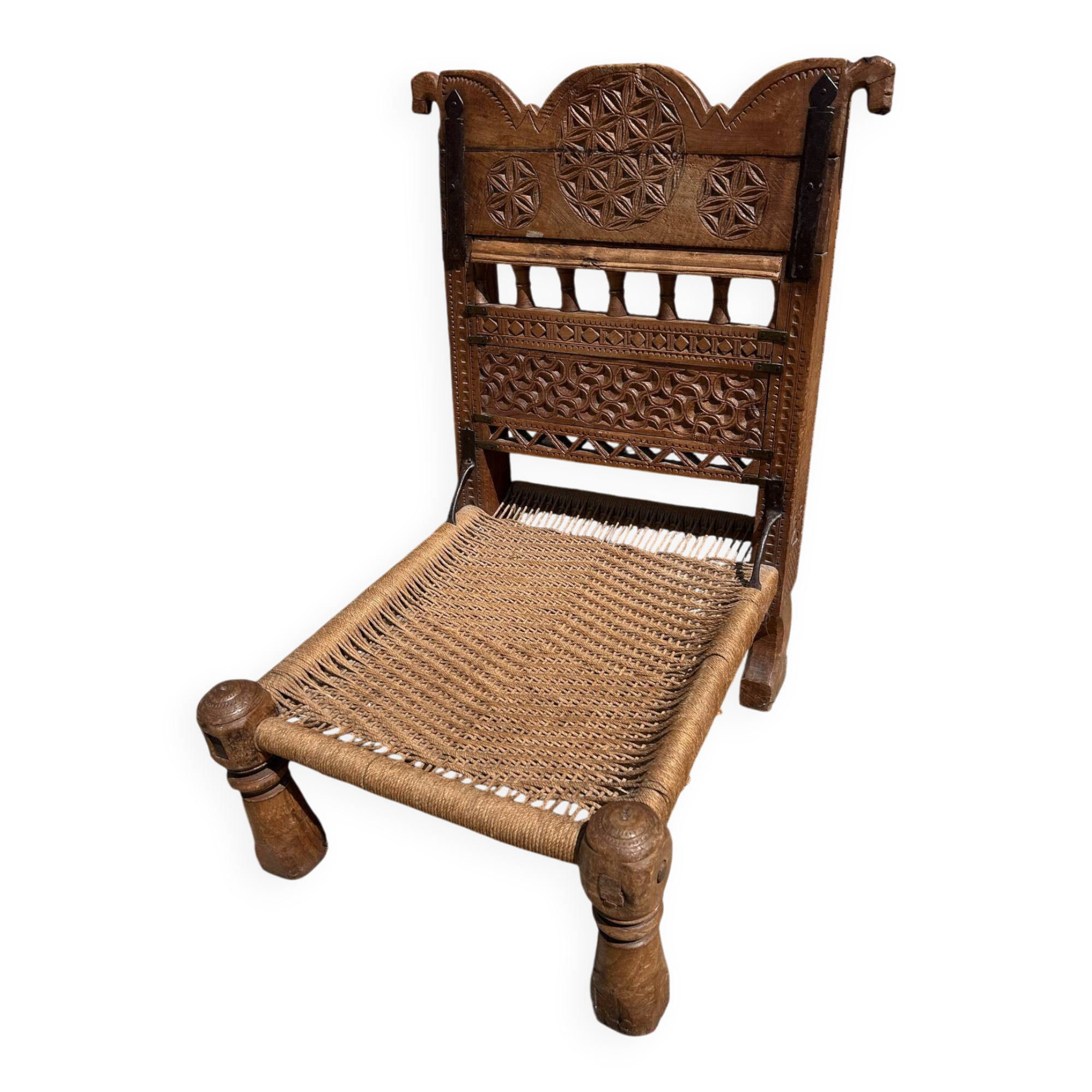 Antique ethnic chair in carved wood