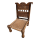 Antique ethnic chair in carved wood