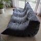 Togo canapé 3 places ligne roset avec un pouf