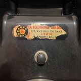 Old Ericsson wall telephone in black bakelite