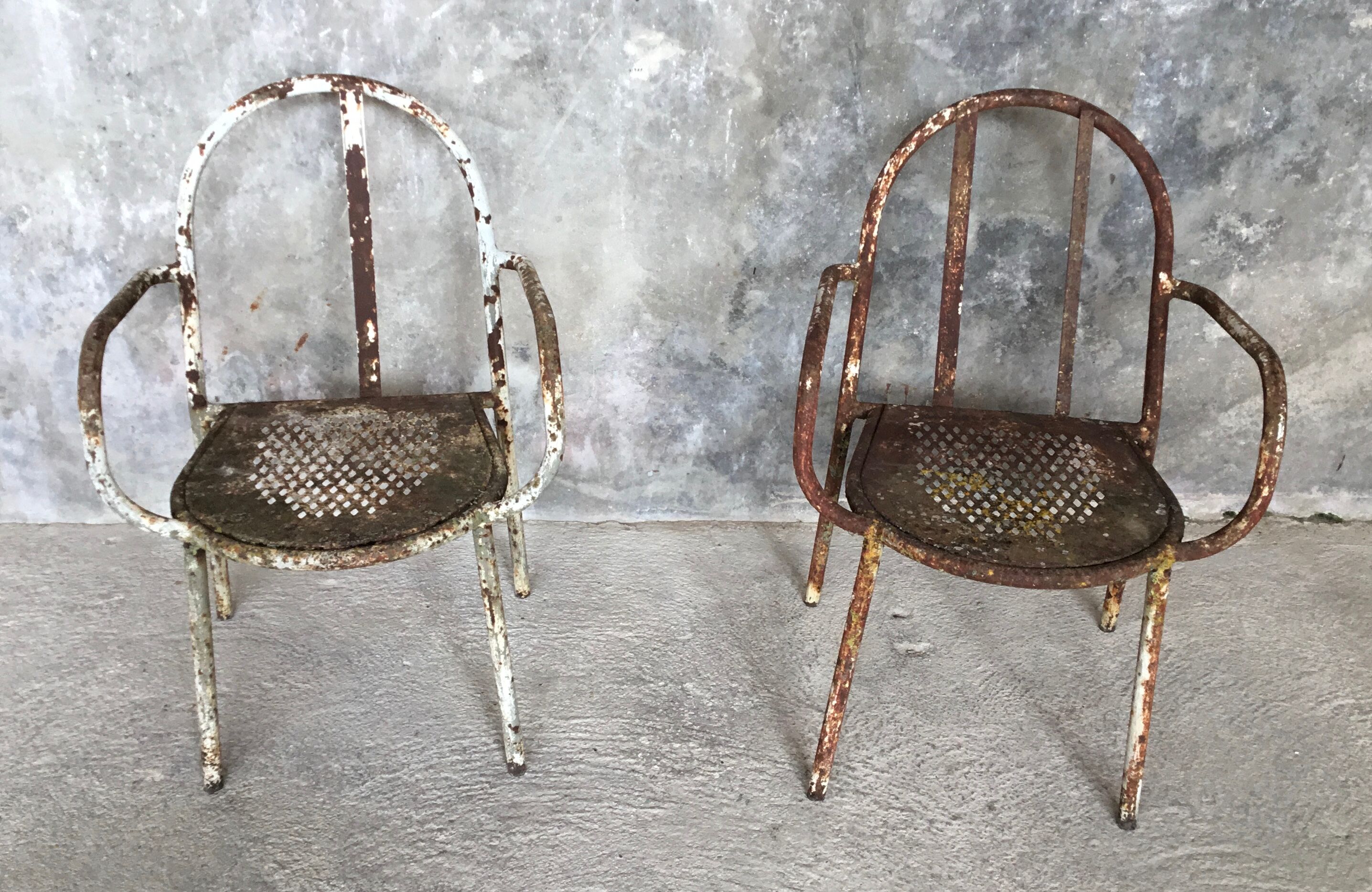 Pair of metal armchairs