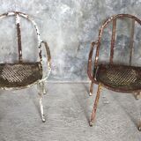 Pair of metal armchairs