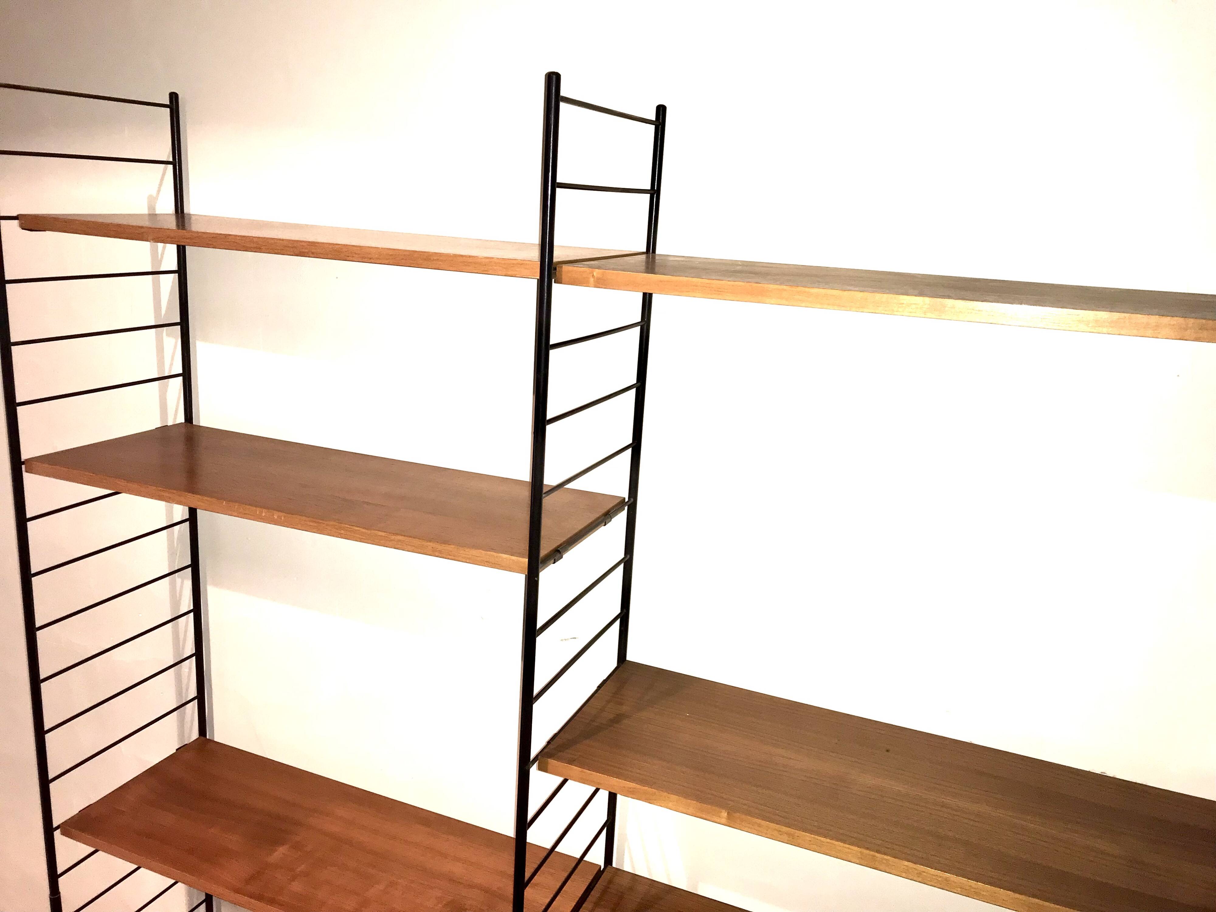 Vintage modular wall-mounted library shelf in blond walnut 1960-80