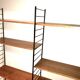 Vintage modular wall-mounted library shelf in blond walnut 1960-80