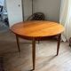Scandinavian round teak table with butterfly extensions from the 60s
