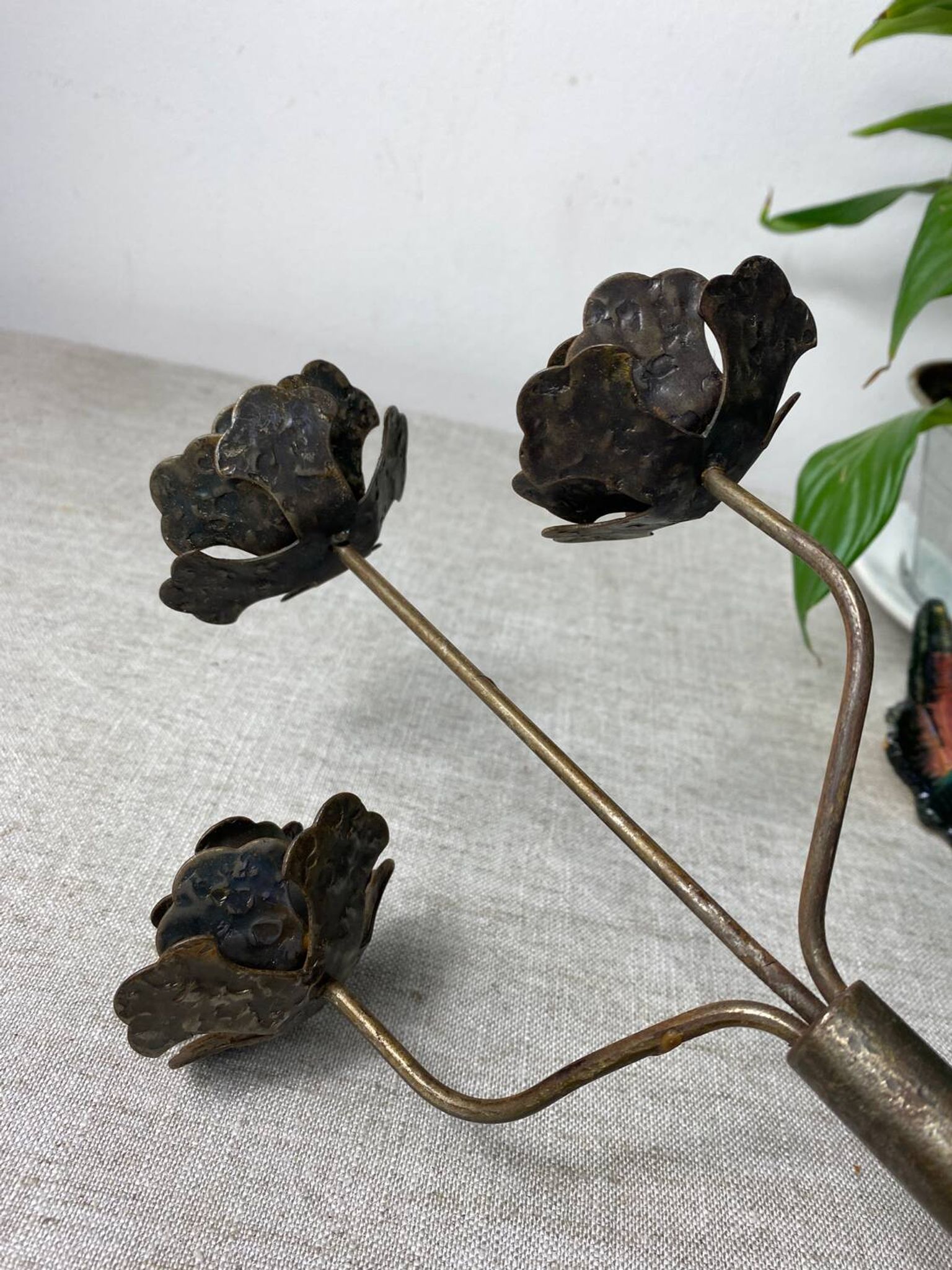 Rose shaped metal candle holder