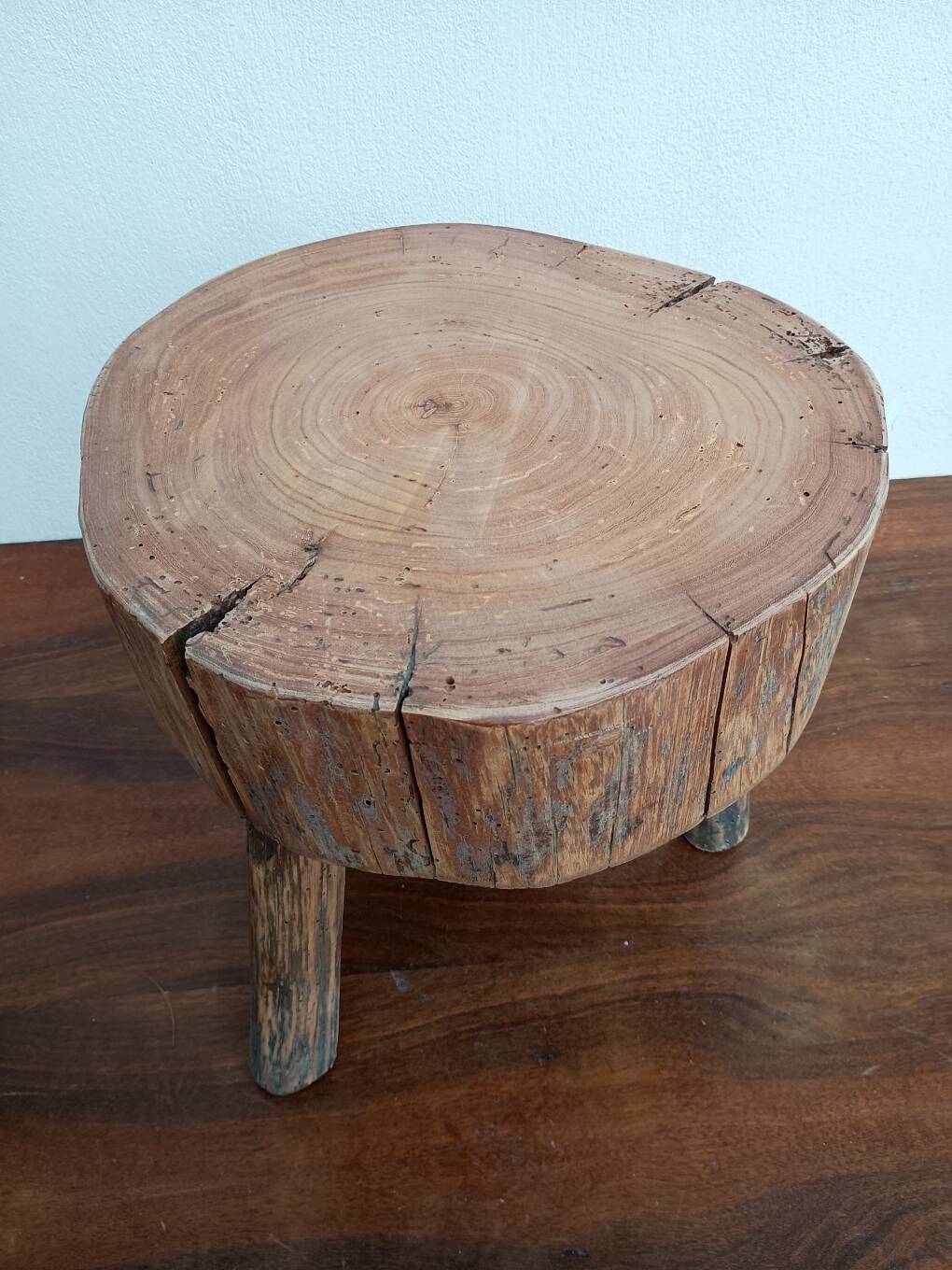 Brutalist tripod coffee table in solid wood.
