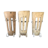 Lot of three terracotta and wrought iron appliques