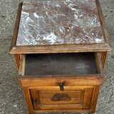 Art Deco period bedside table in carved wood and marble