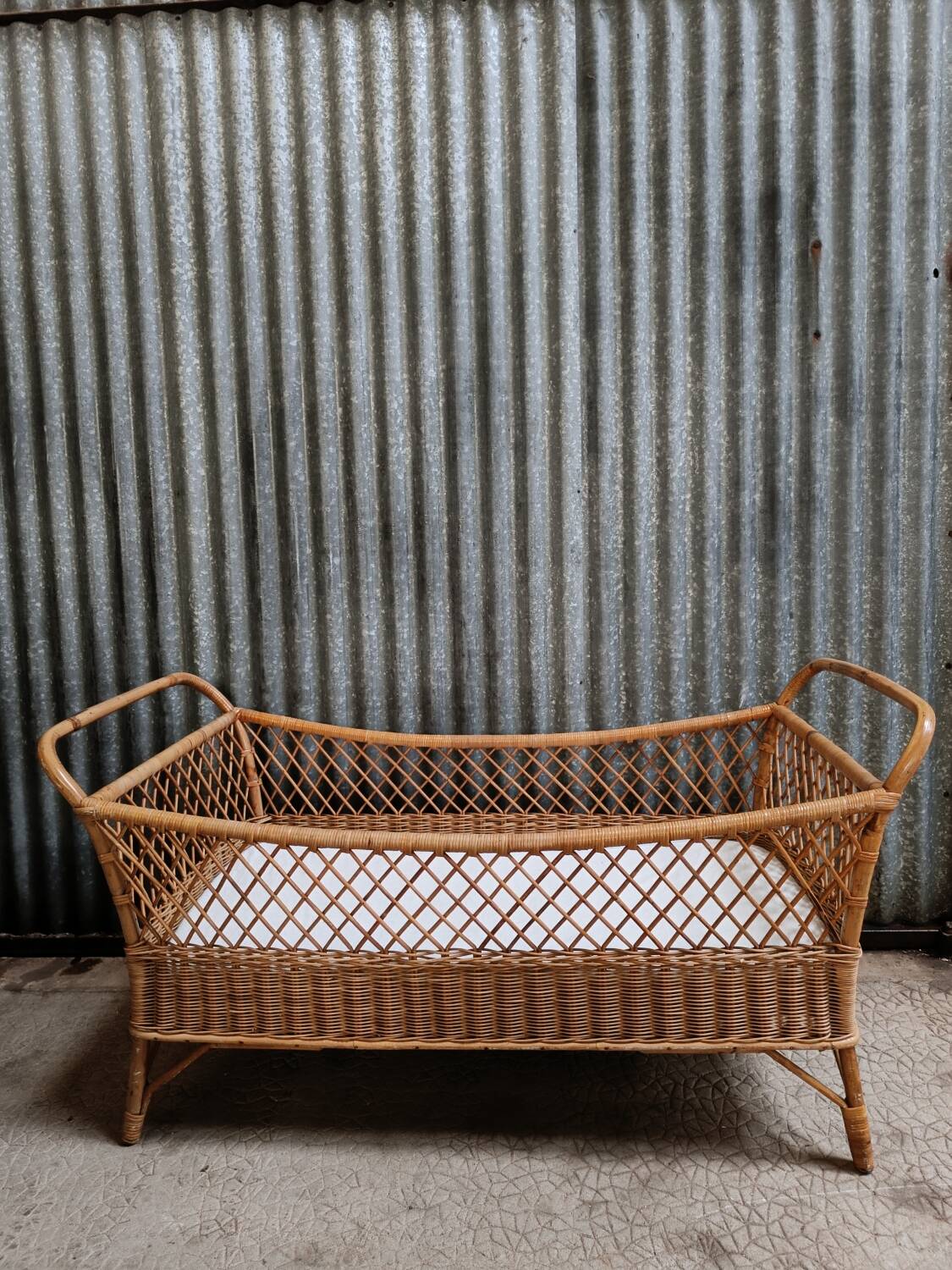 Vintage rattan wicker baby bed