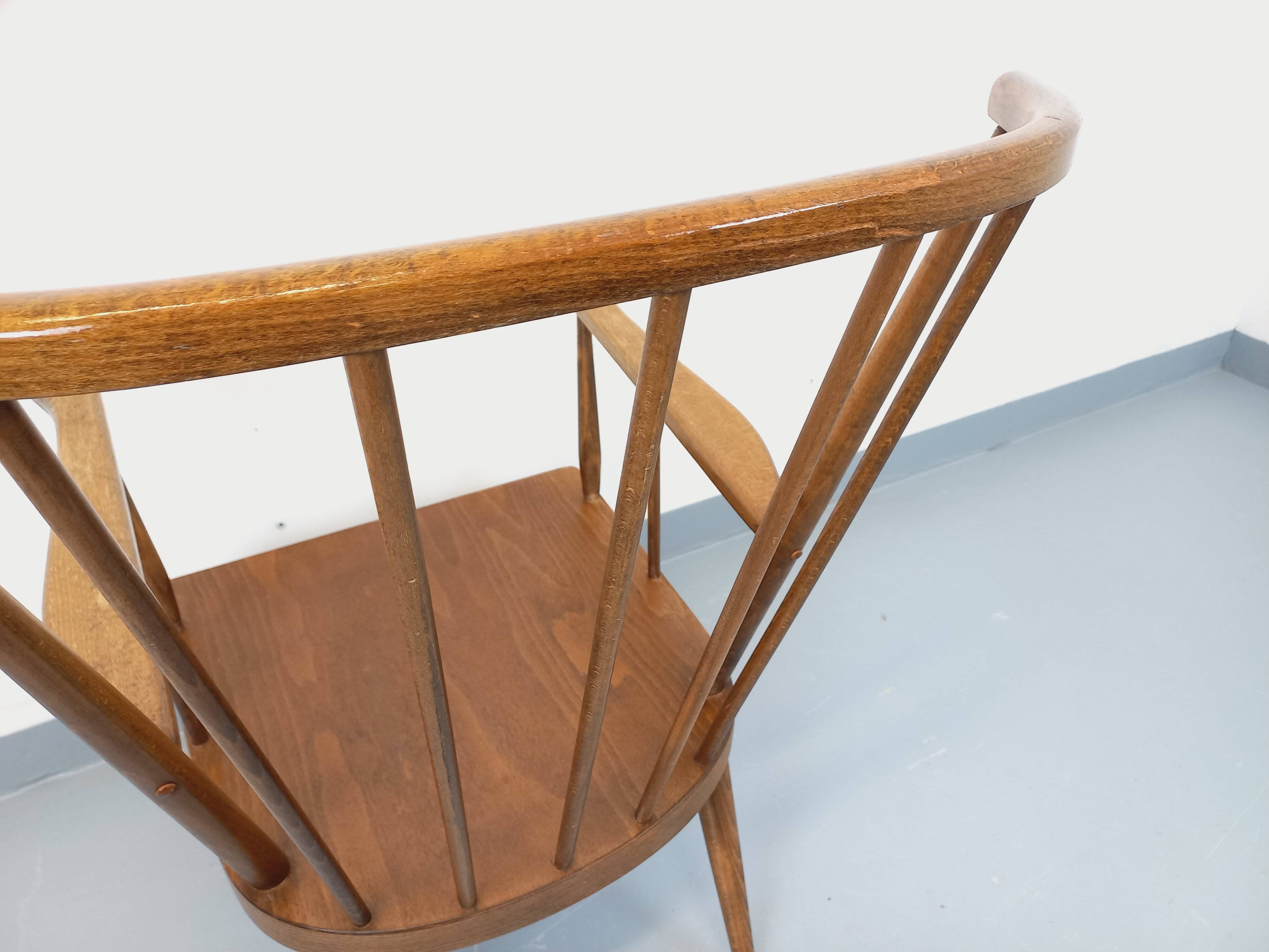 Vintage wooden armchair Baumann model Éventail from the 1960s.