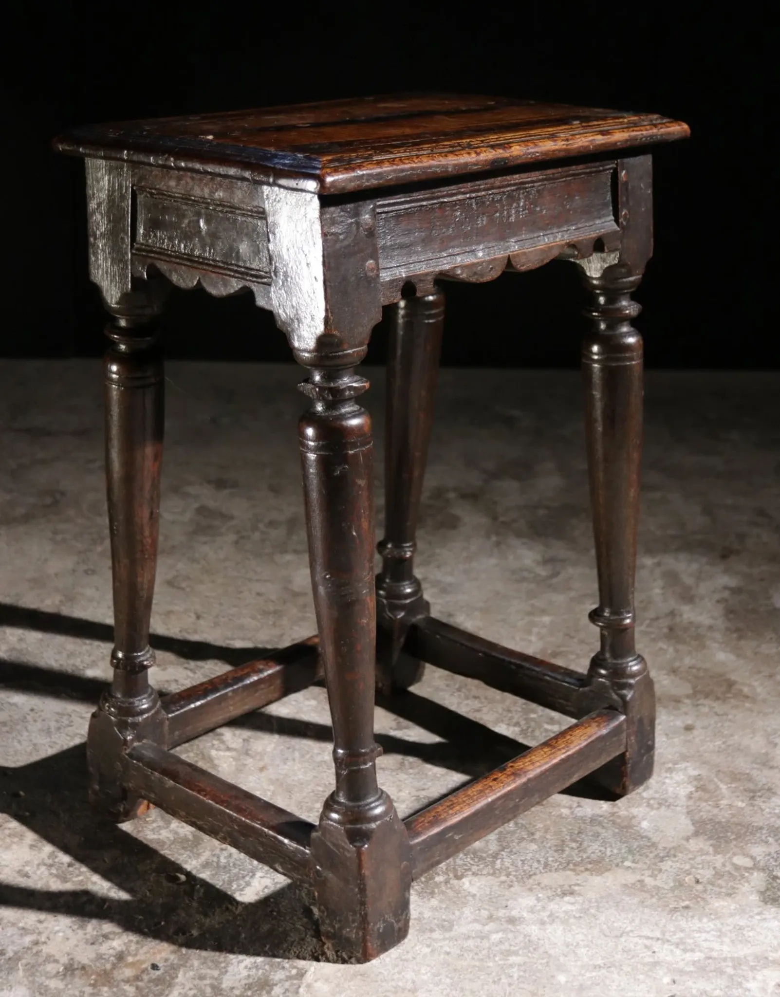 17th-century English oak joint stool with turned legs