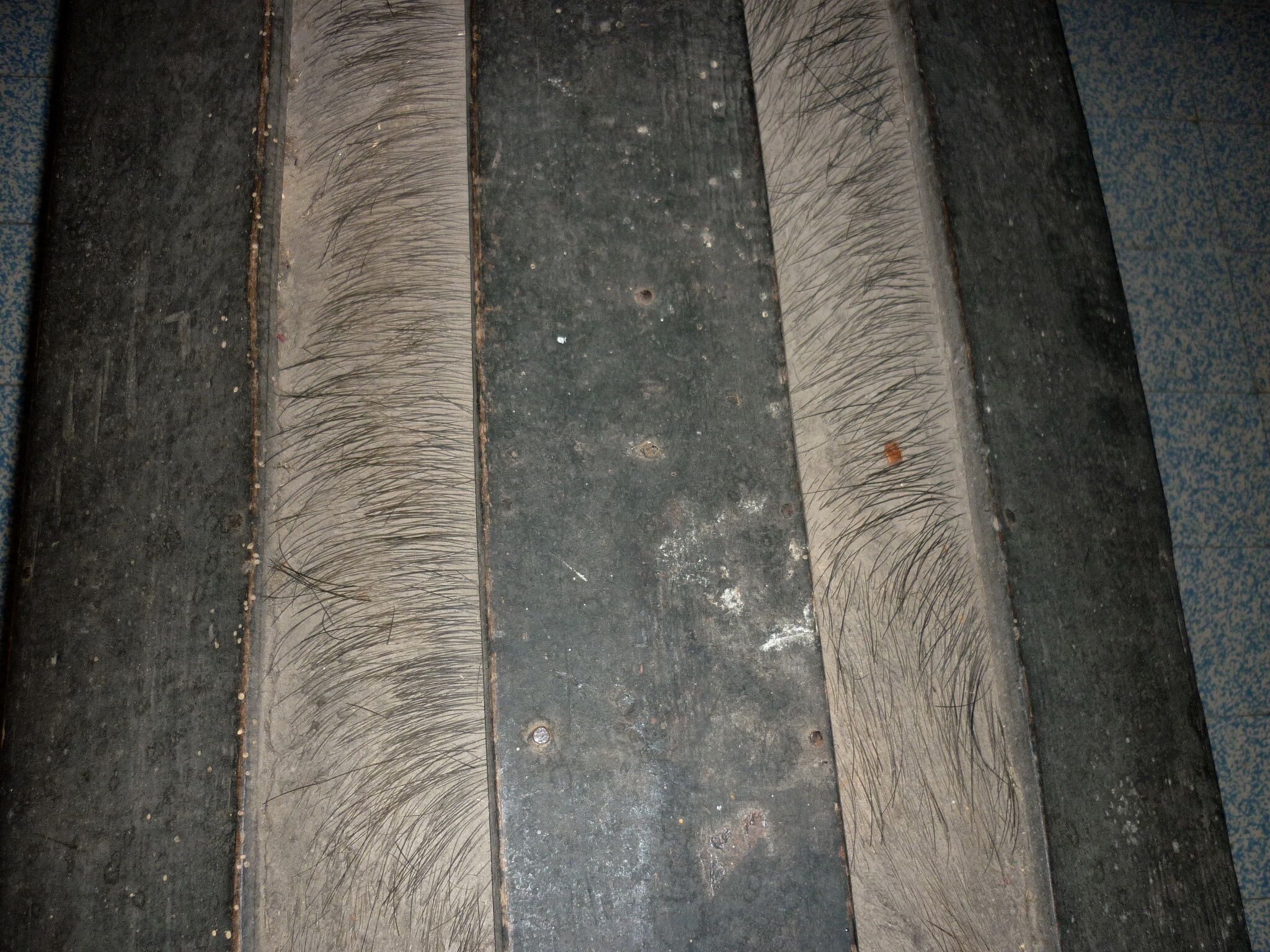 Old bulging wooden travel trunk