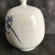Vase boule à col pincé aplati