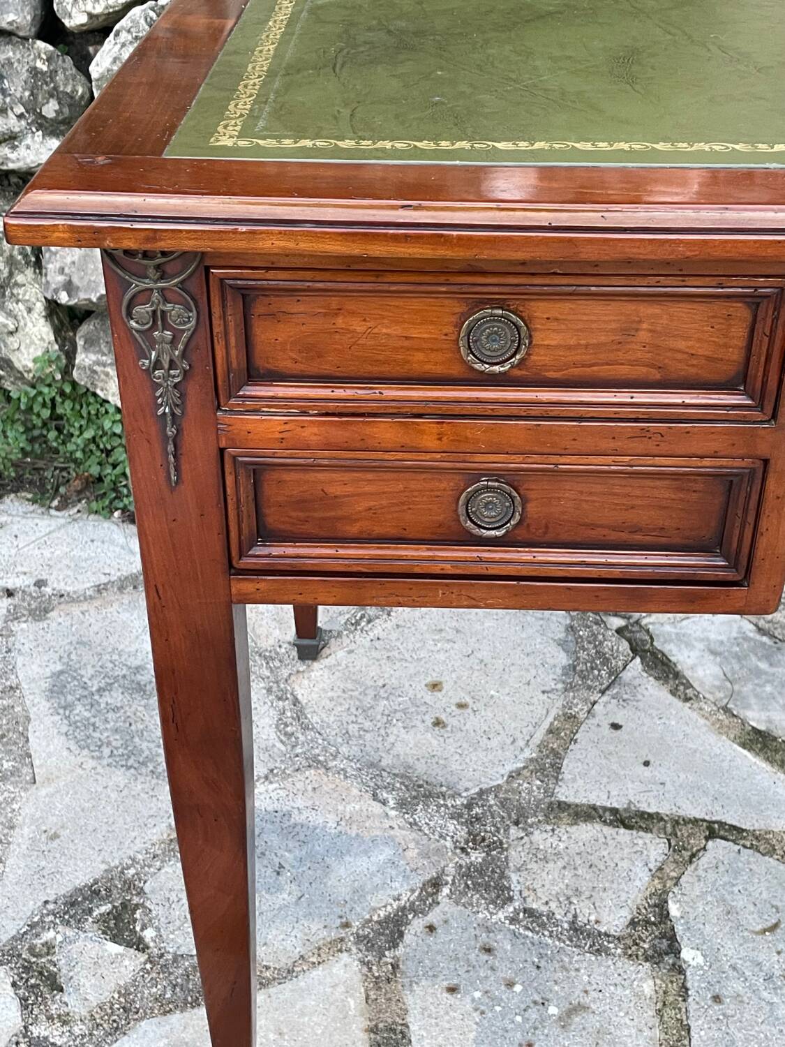 Elegant Louis XVI style mahogany flat desk from the 20th century
