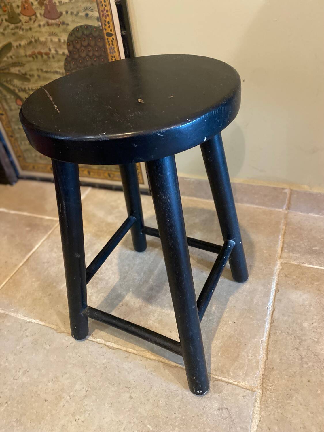 Black wooden stool