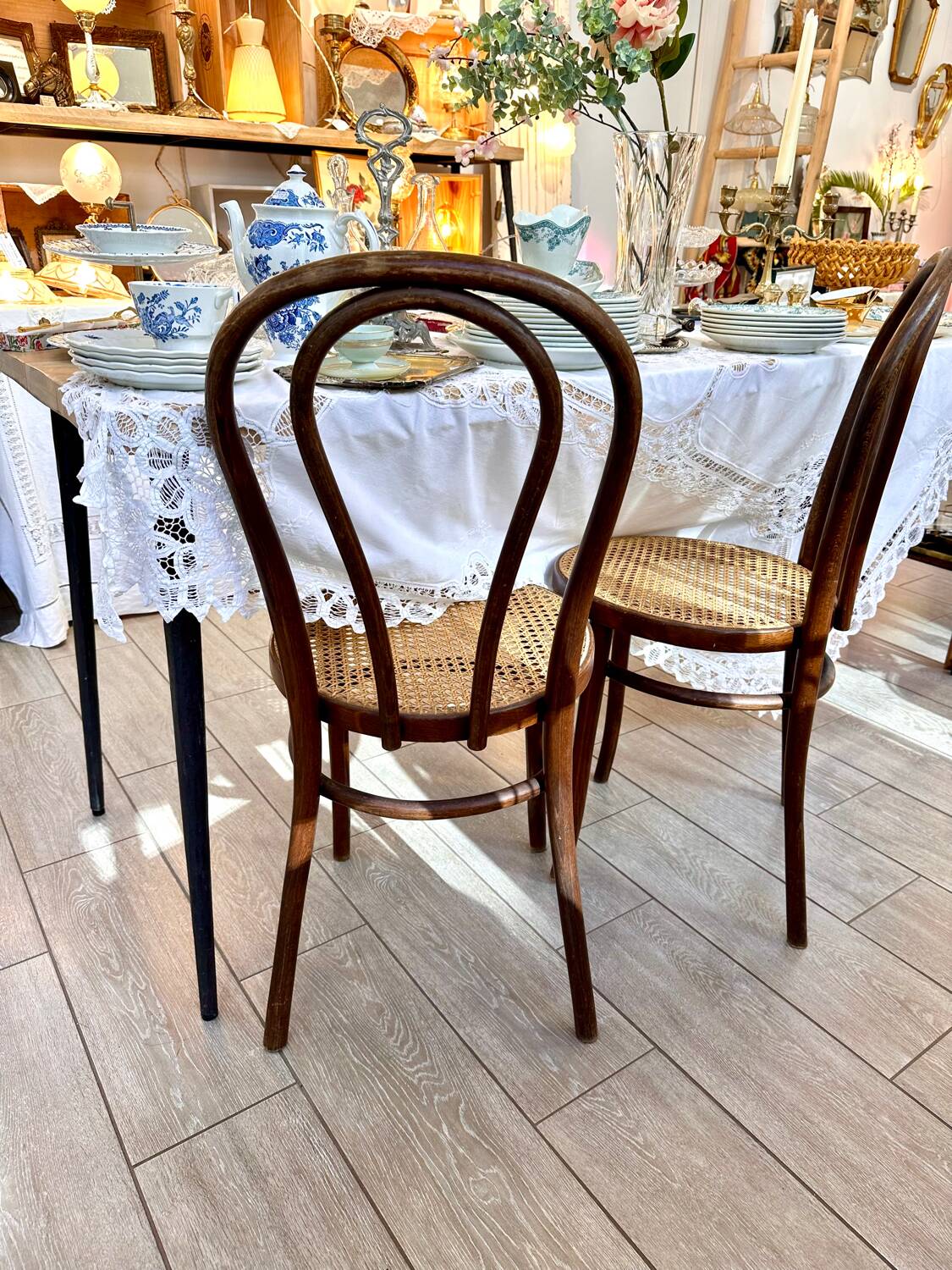 Wooden and cane bistro chairs