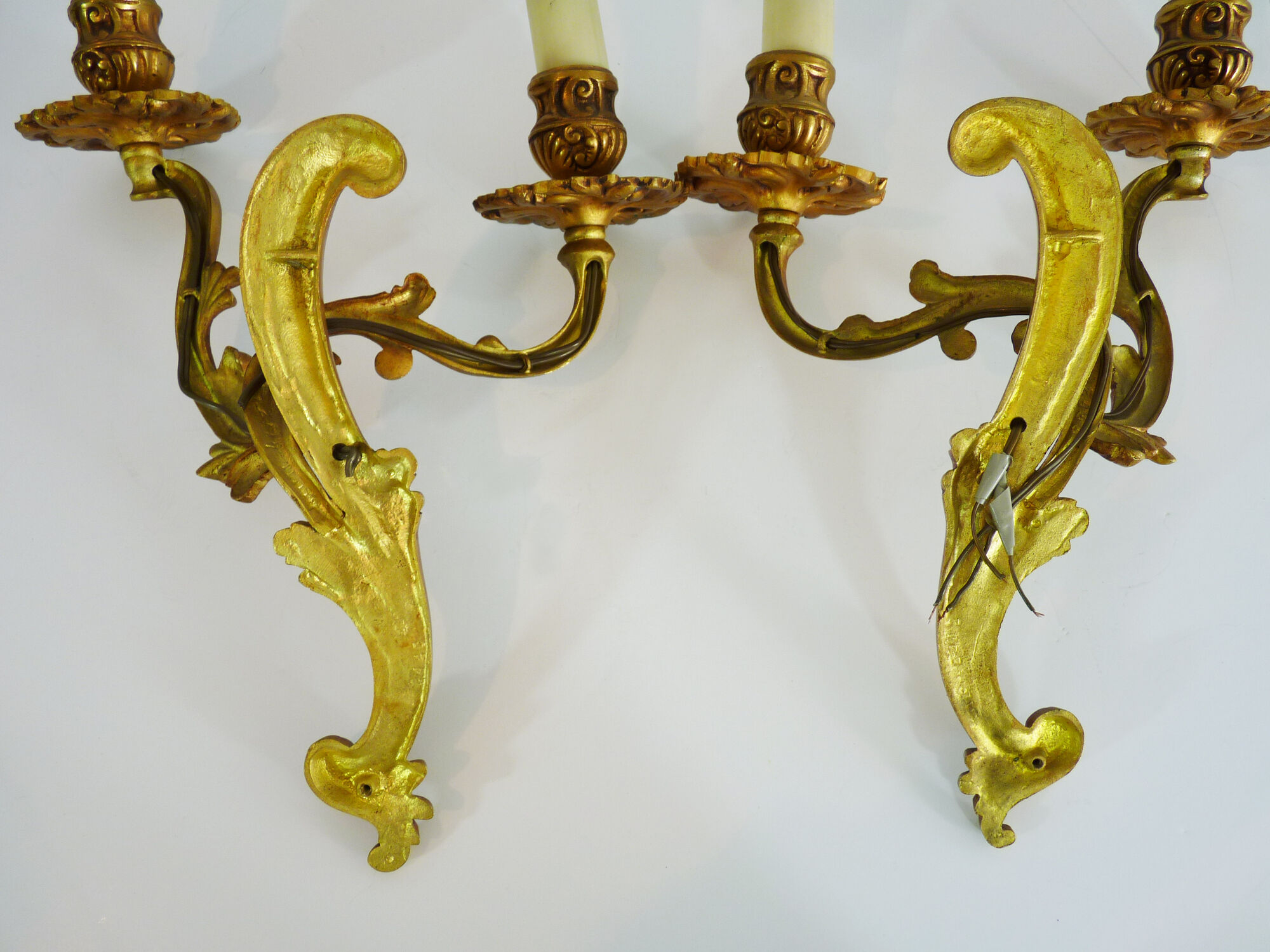 Former pair of double-light wall light in bronze or brass. Year 50 60