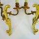 Former pair of double-light wall light in bronze or brass. Year 50 60