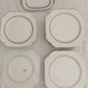Jean BOYER Limoges FRANCE part of a white porcelain table service.