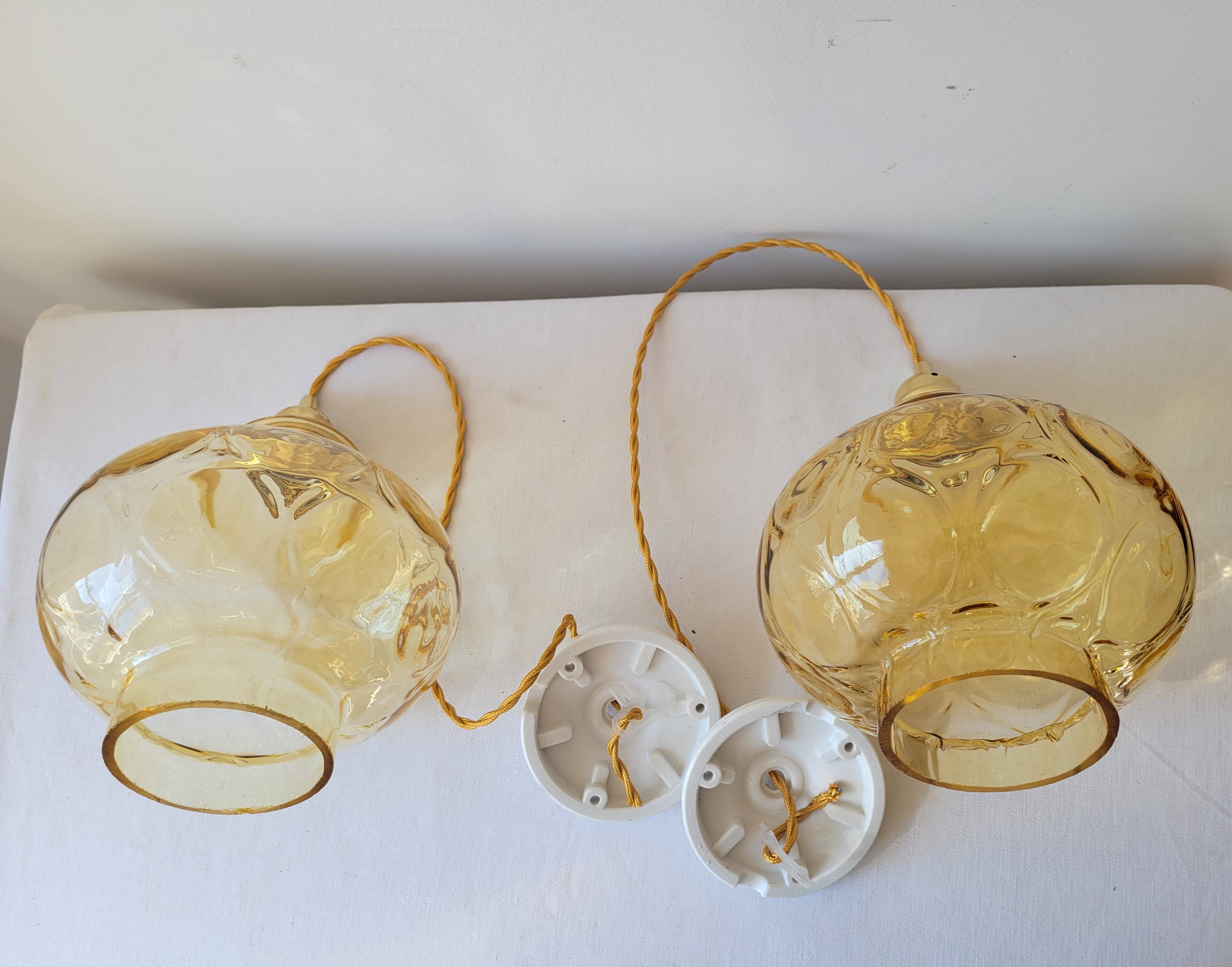 Duo of amber glass pendant lights