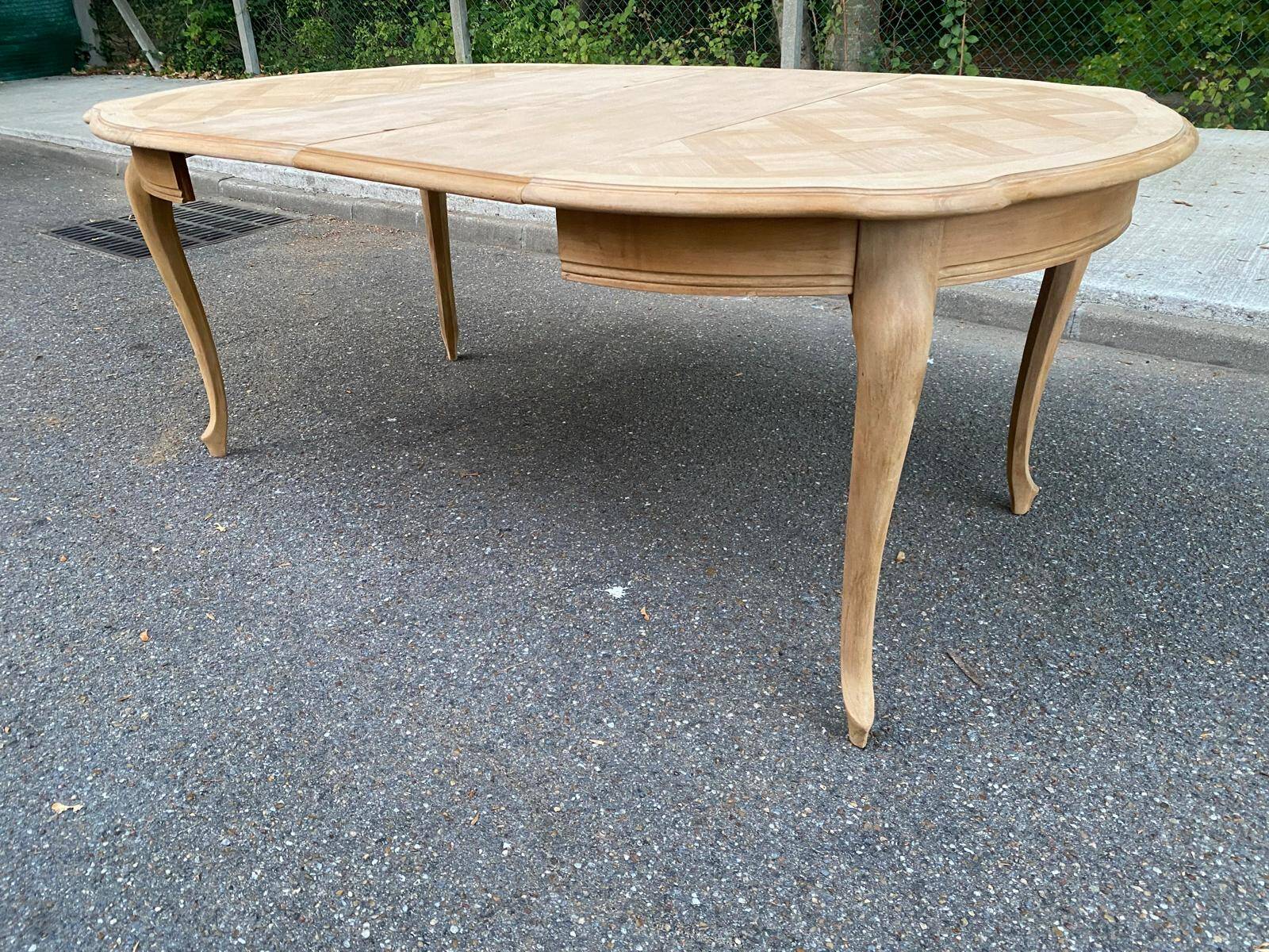 Round extendable dining table Louis XV stripped in solid cherry wood 1960