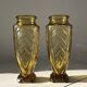 Duo of art deco vases in yellow glass with scroll patterns