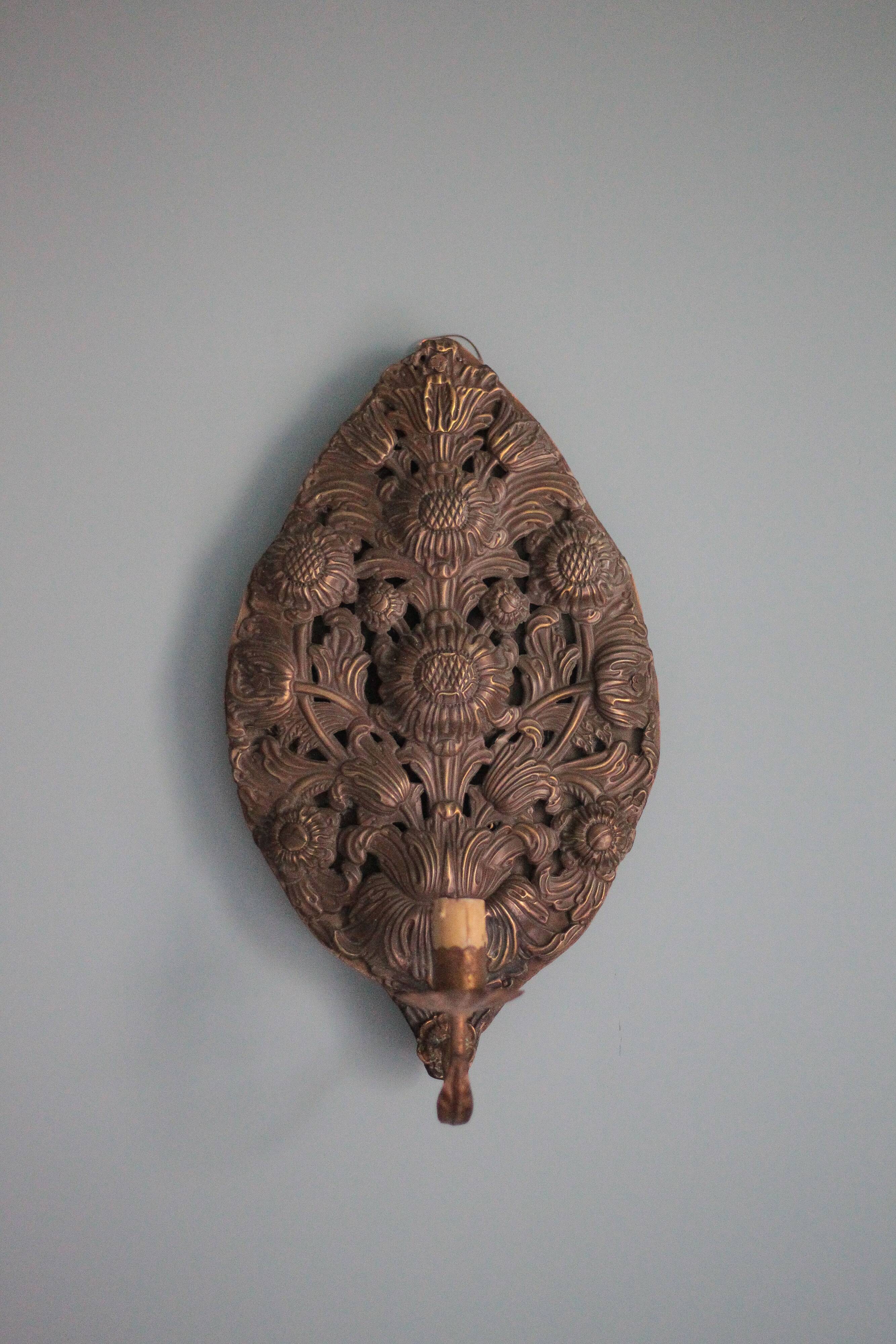 Pair of wall sconces in embossed brass with floral patterns, wall lamp, sconce.