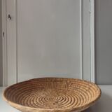 Ethnic plateau in woven palm leaf