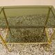 Antique brass serving trolley with smoked glass top, Louis XVI style.