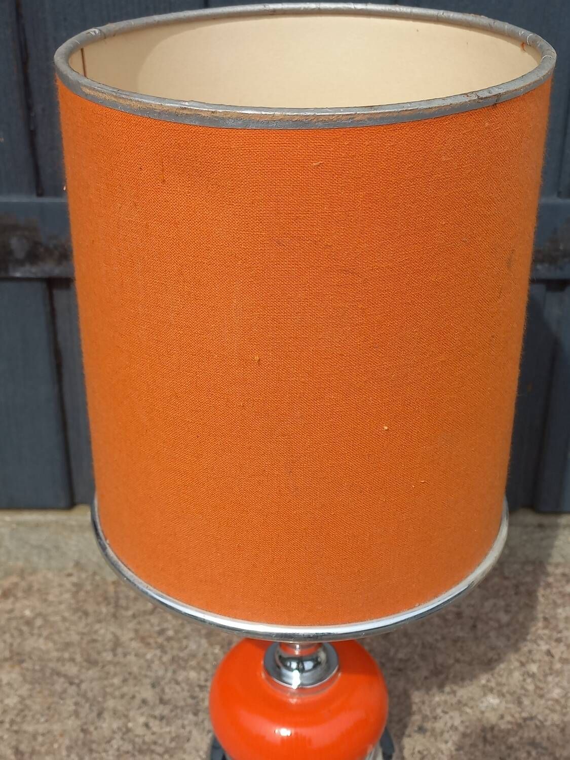 Designer lamp from the 70s in chrome metal and orange lacquered wood