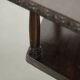 Antique wooden English rotating book table/side table from the 19th century