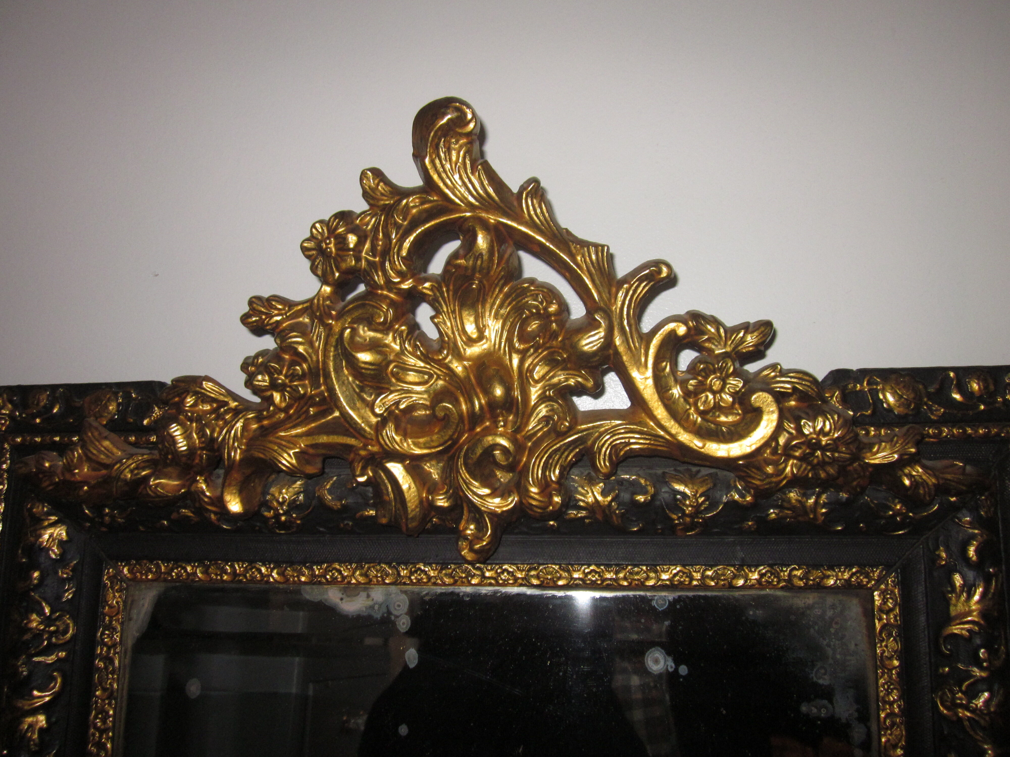 Old mirror with pediment