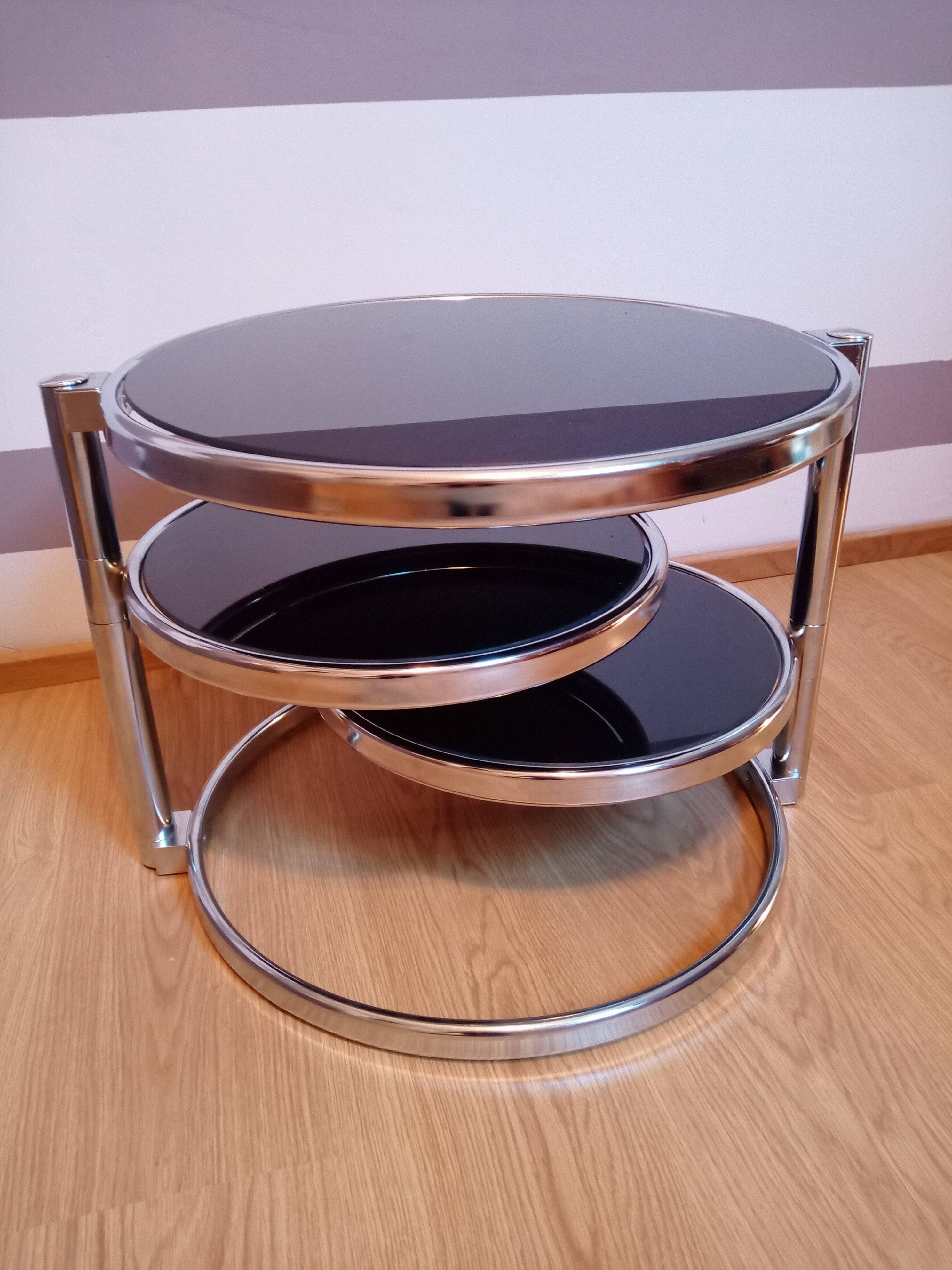 Chrome metal coffee table and swivel-tray glass
