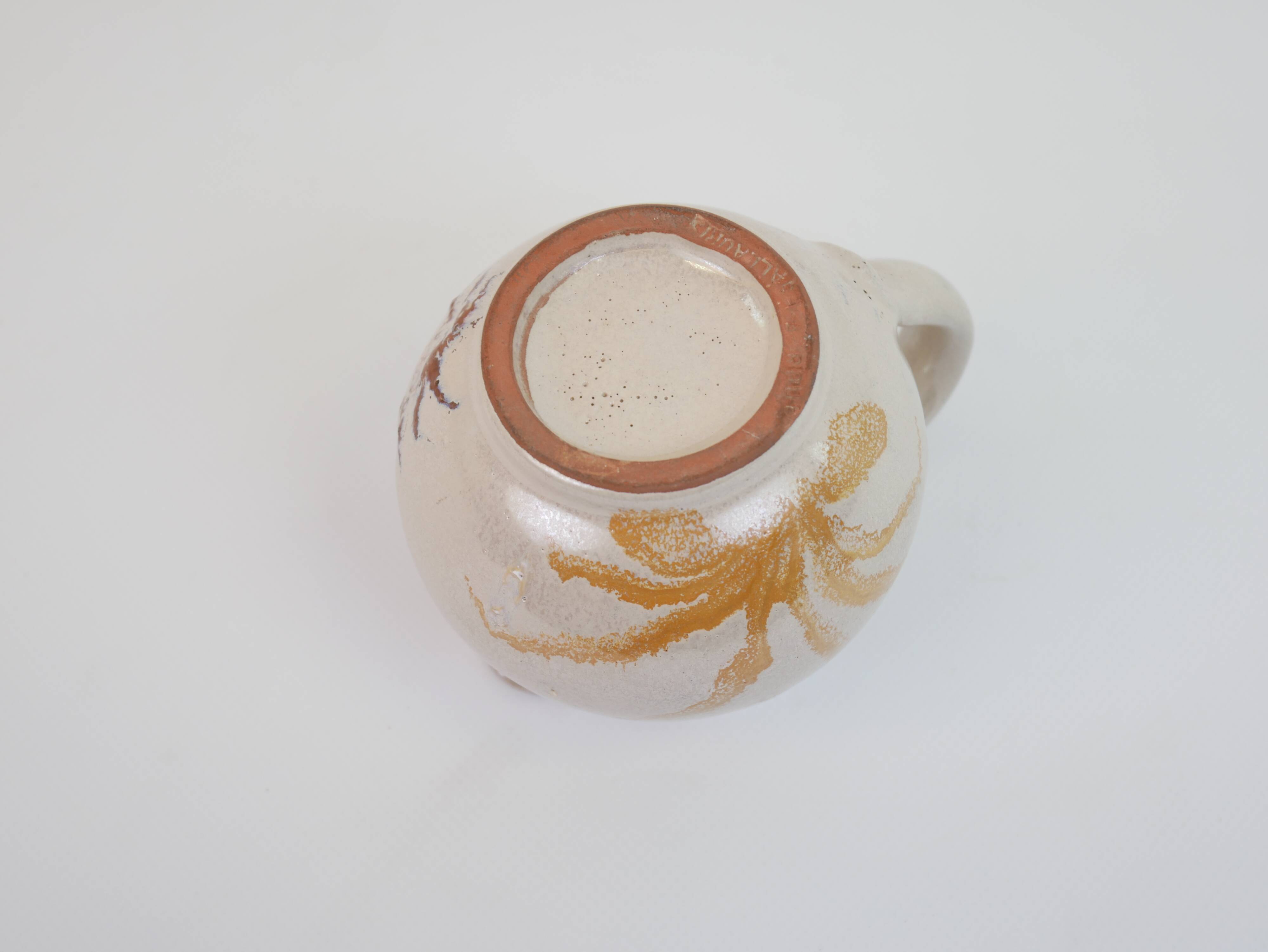 Pair of ceramic milk jugs signed La Roue Vallauris
