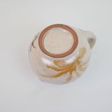 Pair of ceramic milk jugs signed La Roue Vallauris