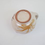 Pair of ceramic milk jugs signed La Roue Vallauris