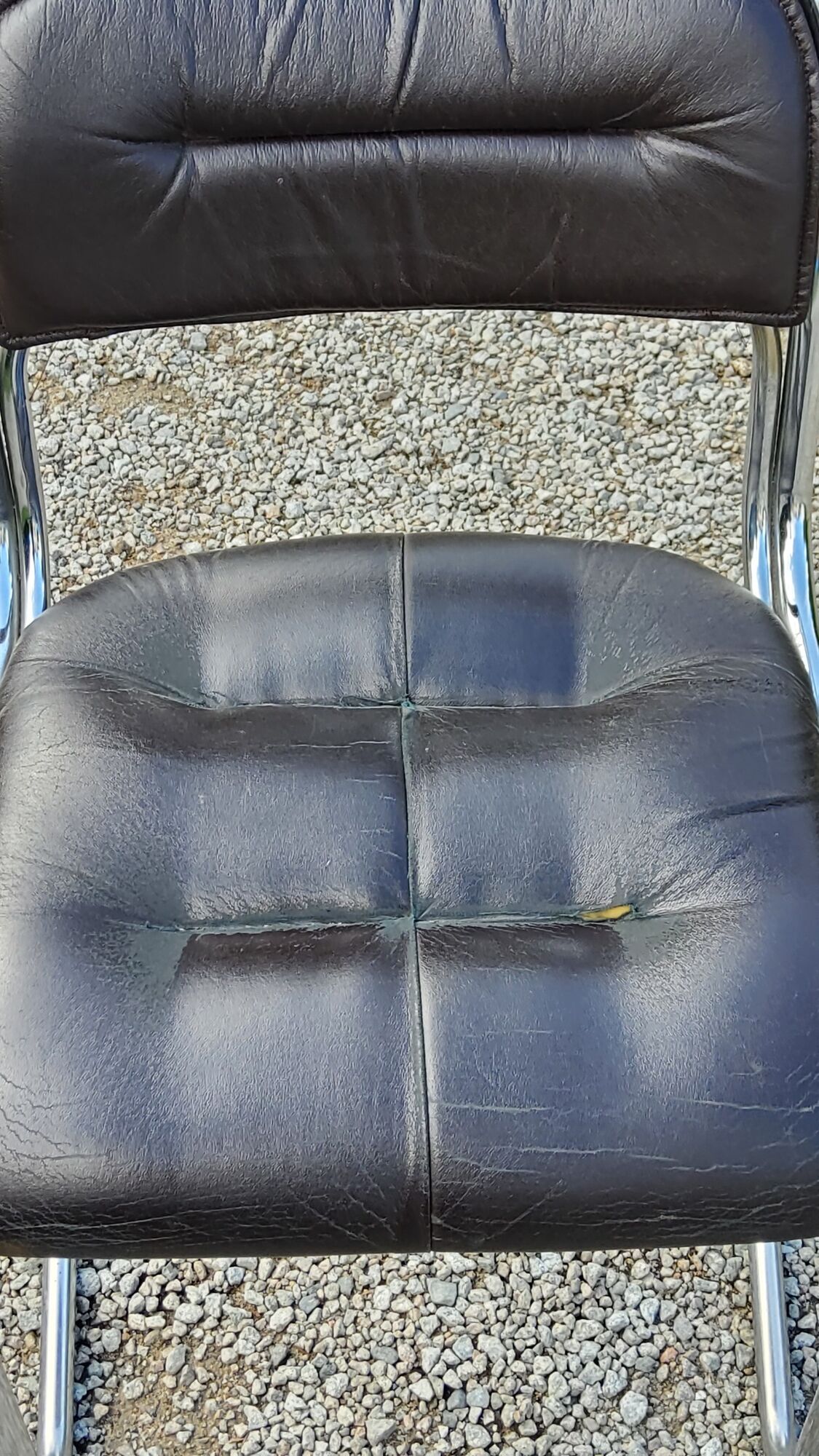Chair from the 70s in chromed metal and brown moleskine
