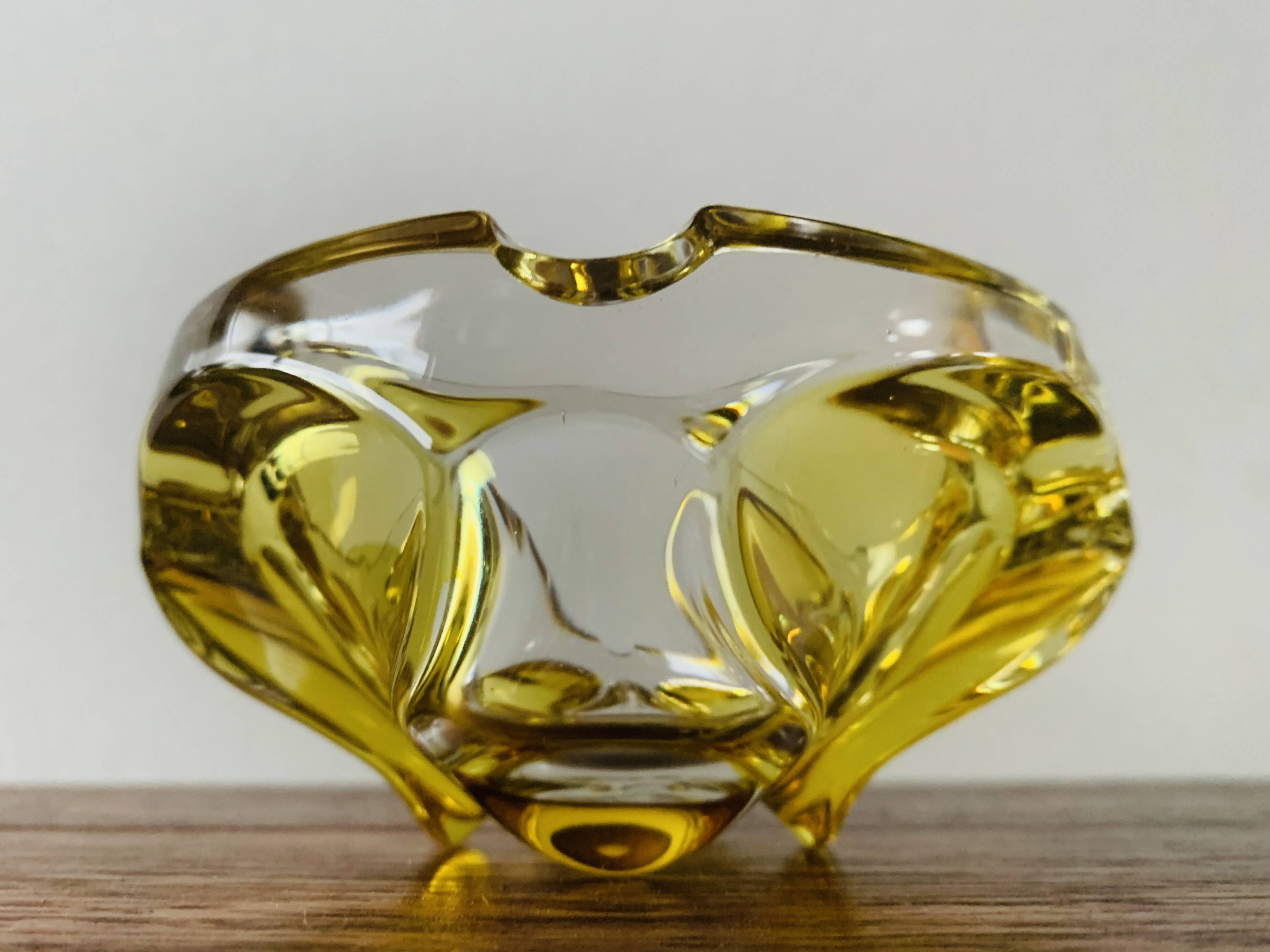 Vintage ashtray in yellow and transparent molded glass